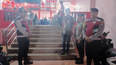 AKP Rio Adrian Polsek Belakang Padang Amankan Ibadah Ulambana dan Resepsi Pelelangan di Vihara Dharma Bhakti